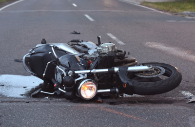Schadenersatz – Sturz eines Motorradfahrers wegen Rollsplitts auf einer Gemeindestraße